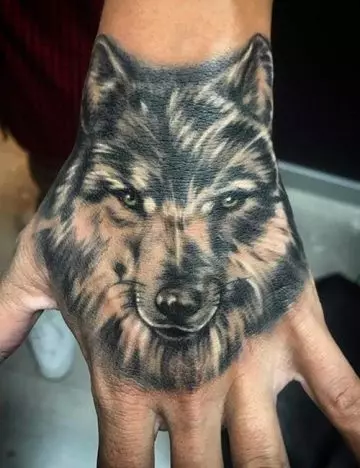 Wolf tattoo on the hand