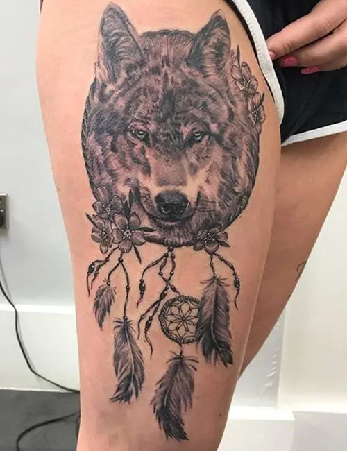 Wolves with dreamcatcher tattoo
