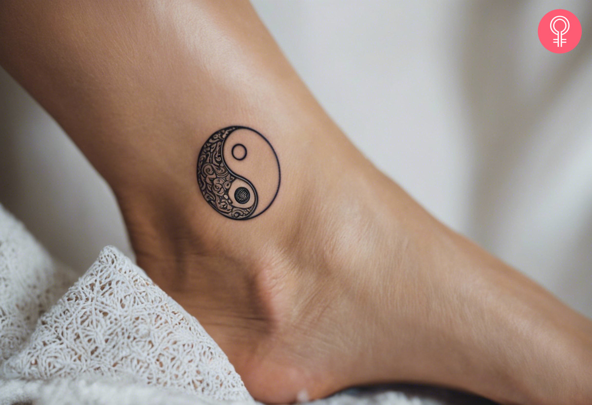 A woman with a yin-yang tattoo on her ankle
