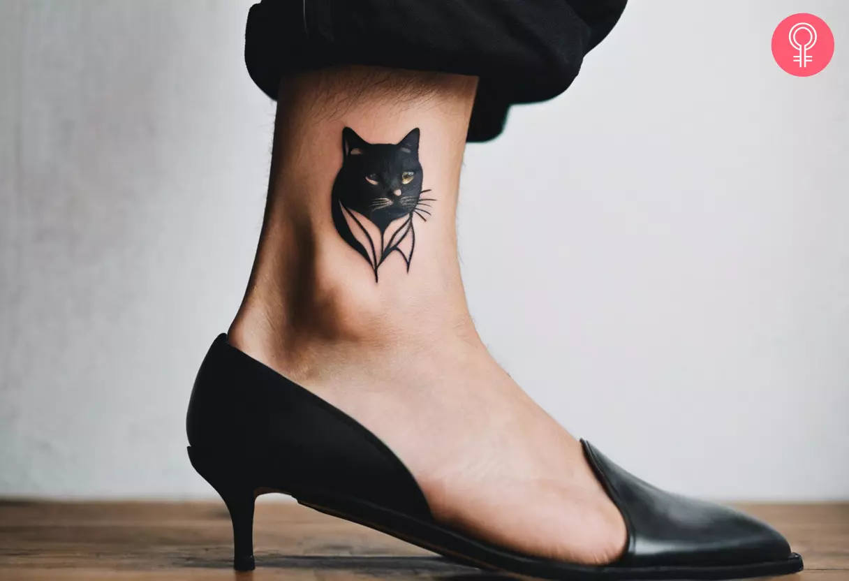 a cat in suit bust tattoo on the ankle