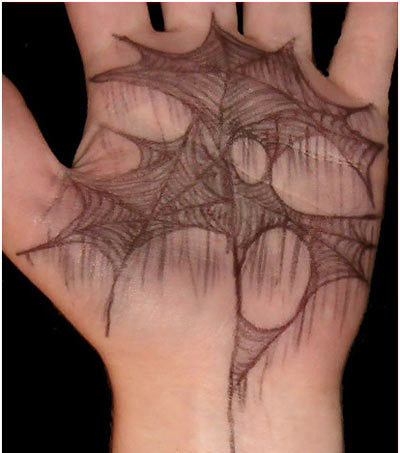 Spider hanging from web tattoo design
