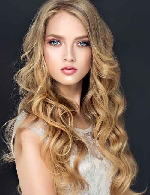 Beautiful girl with shaggy blonde waves hairstyle