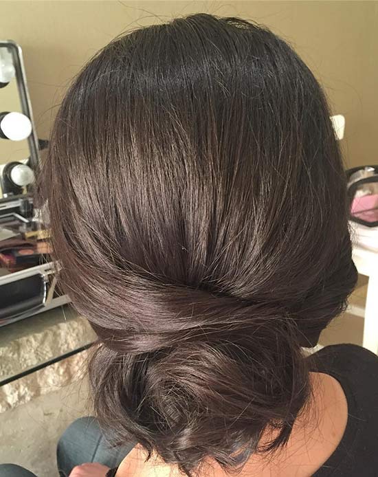 Loose bun as bridal hairstyle for long hair