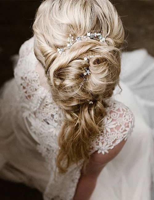Big and small bijouterie bridal hairstyle for round face
