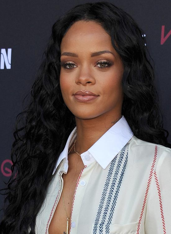 Rihanna sporting beachy black waves hairstyle