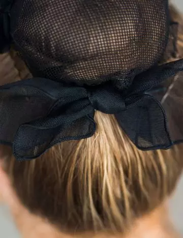 Braided bun with a bow updo for medium hair