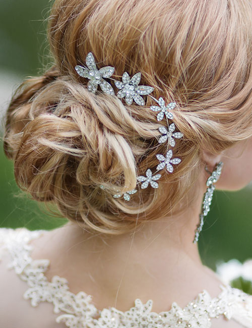 Casual updo with decorative lace for medium hair