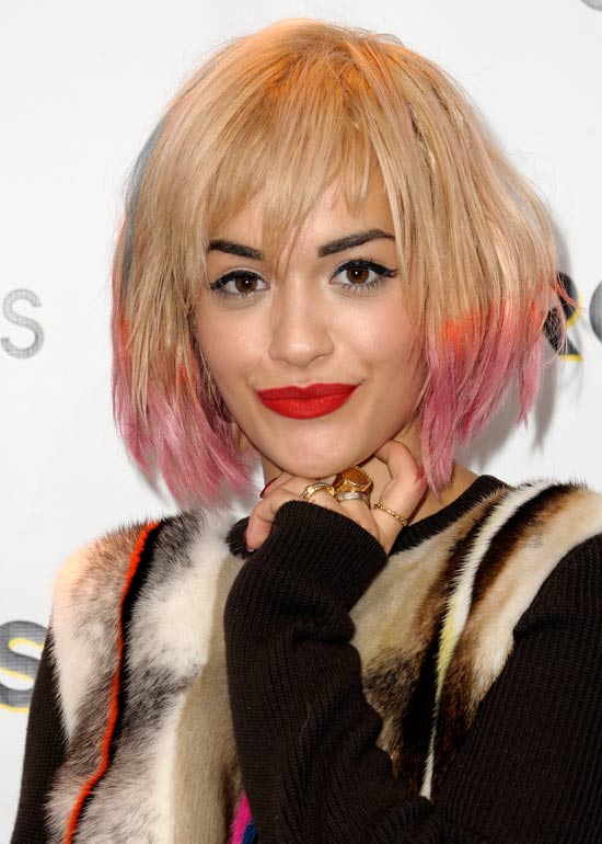 Funky curled in pink tinged bob hairstyle for short hair