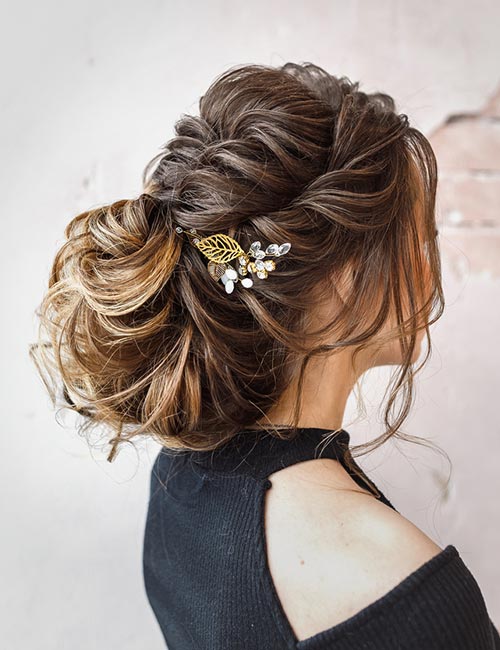 Curly bridal updo bun hairstyle for long hair
