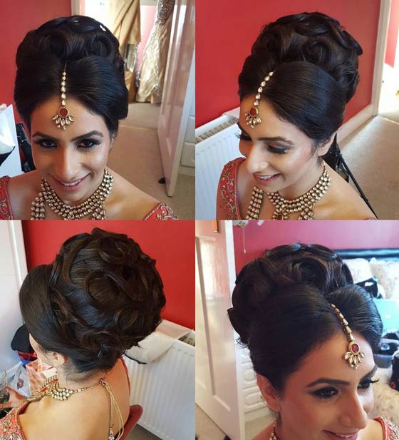 Dramatic center parted bun Indian bridal hairstyle