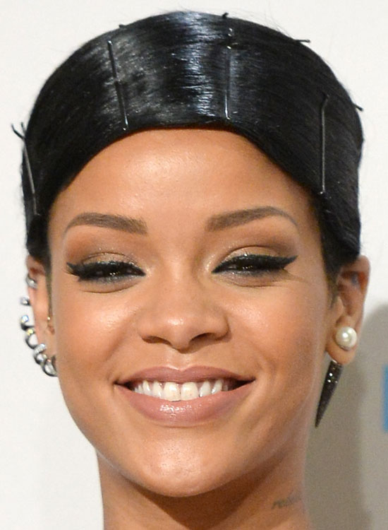 Rihanna sporting a headband hairdo