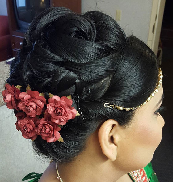 Intricate floral updo Indian bridal hairstyle