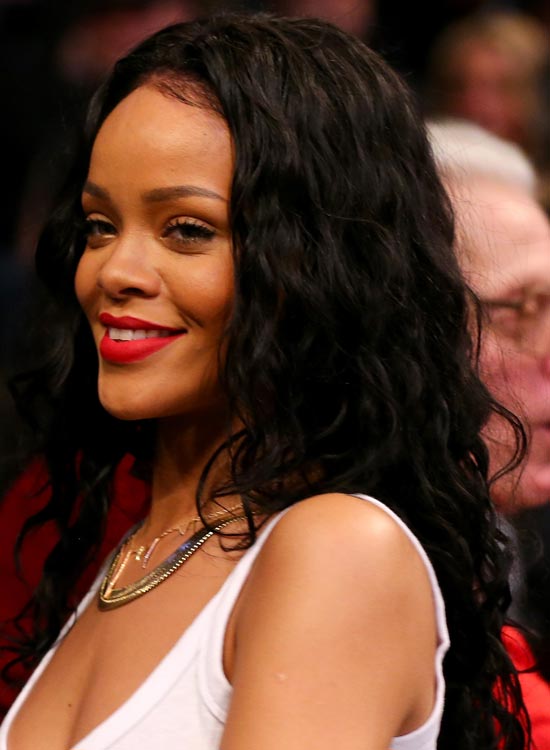 Rihanna sporting long bed curls