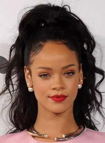 Rihanna sporting a messy ponytail