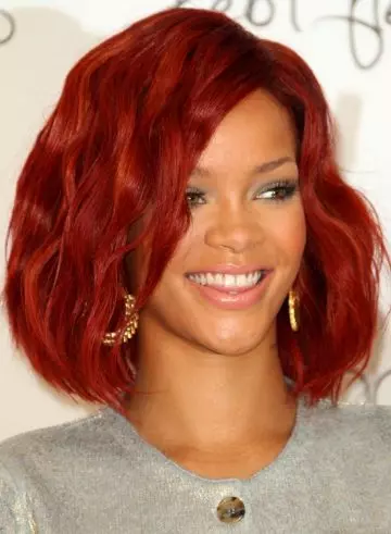Rihanna sporting a messy rouge blunt bob hairstyle