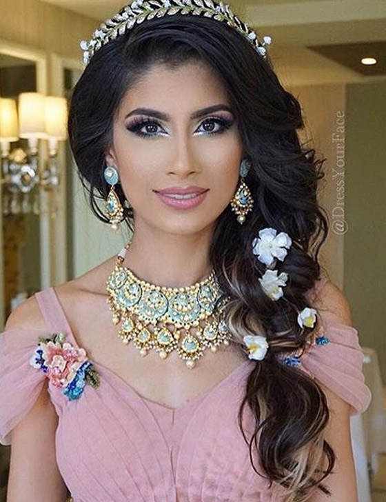 Messy tiara braid Indian bridal hairstyle