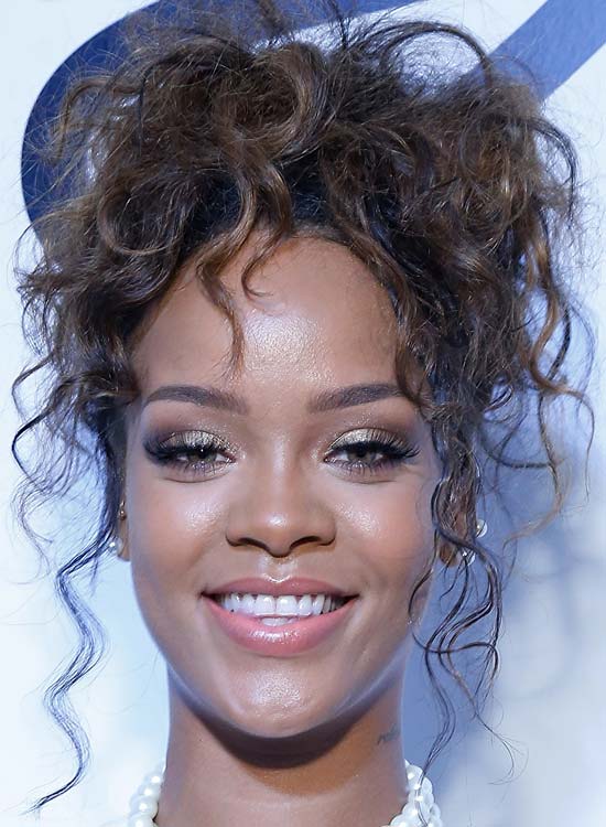Rihanna sporting a messy updo