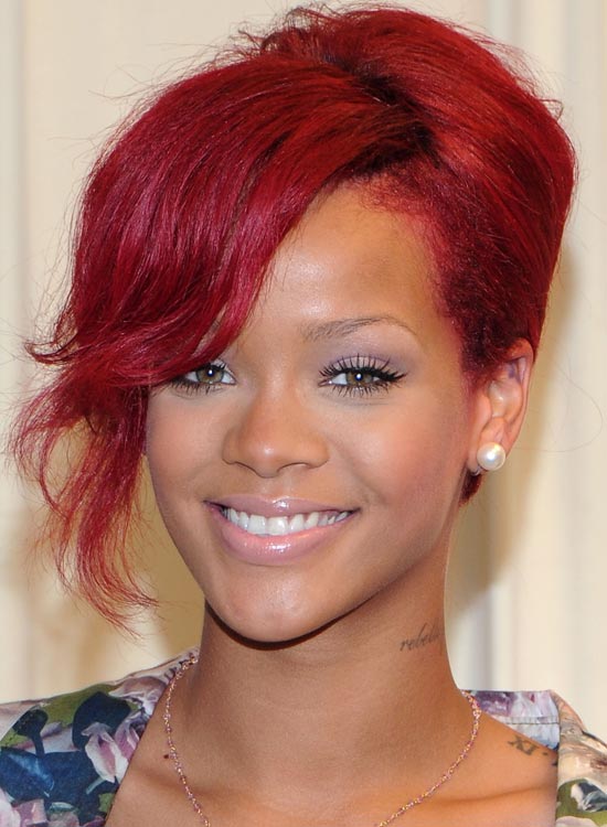 Rihanna sporting her thick yet messy rouge bangs