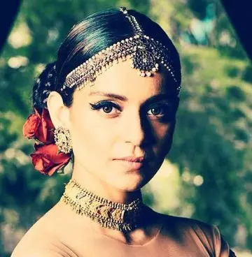 Senorita bun Indian bridal hairstyle