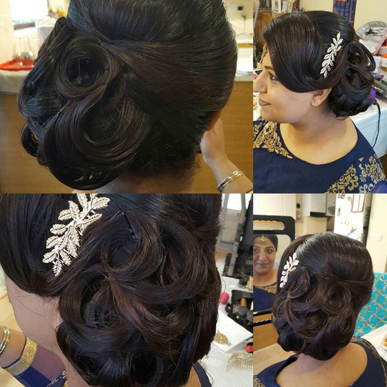 Side parted ringlet bun Indian bridal hairstyle