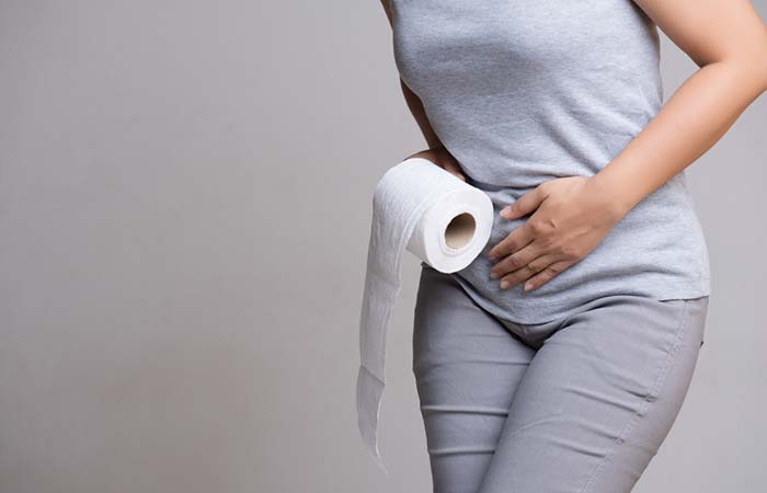 Woman experiencing constipation after eating jujube