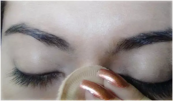 Step 3 of applying gothic eye makeup