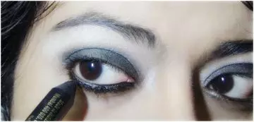 Step 7 of applying gothic eye makeup