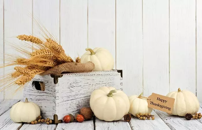 Bucket of white pumpkins