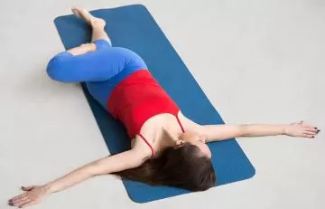 Supta Matsyendrasana basic yoga asana for beginners