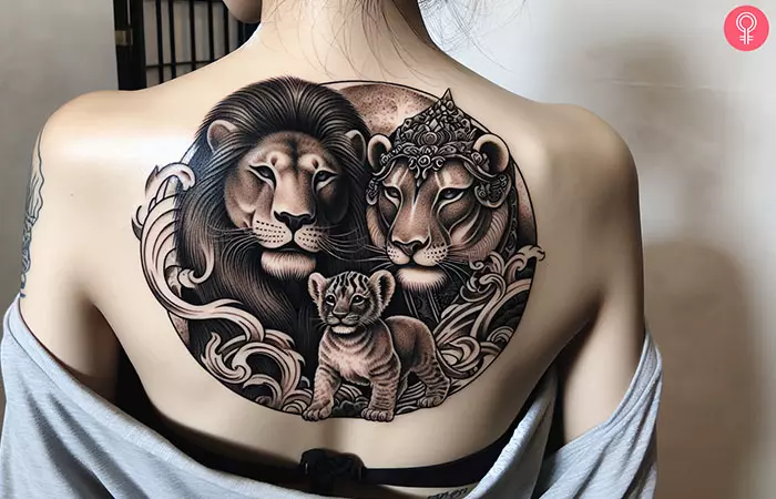 Lion family tattoo on the upper back