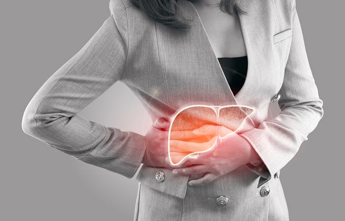 Woman experiencing liver problems as a side effect of having bitter gourd