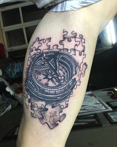 Story with a compass tattoo design