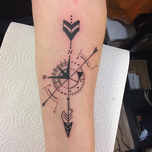 Abstract compass tattoo design