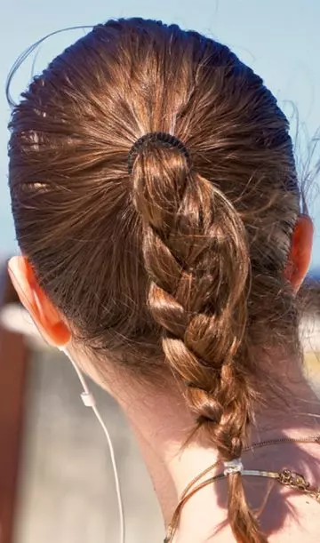 A girl sporting a ponytail braid hairstyle