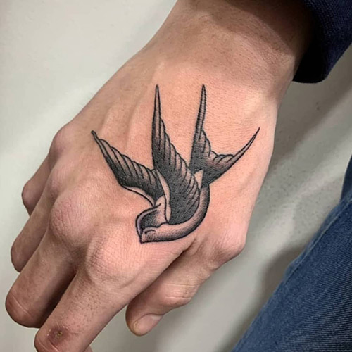 Bird tattoo design on the palm