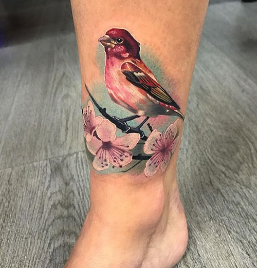 Blossom bird tattoo design