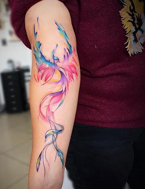 Tatuagem de Fênix em Aquarela no Braço