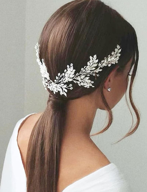 Slick low ponytail with designs like leaves or flowers Japanese hairstyle for women