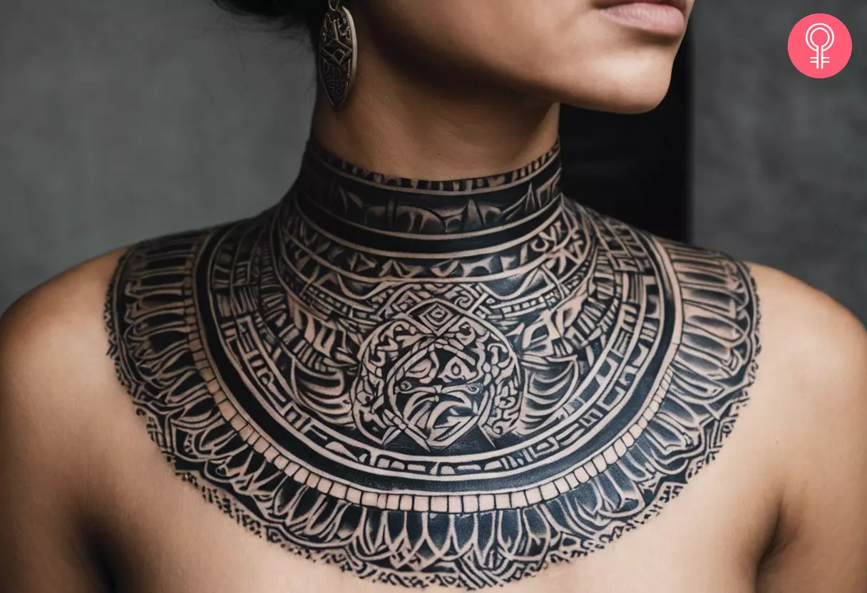 A traditional Mayan jaguar tattoo on a woman’s shoulder blade