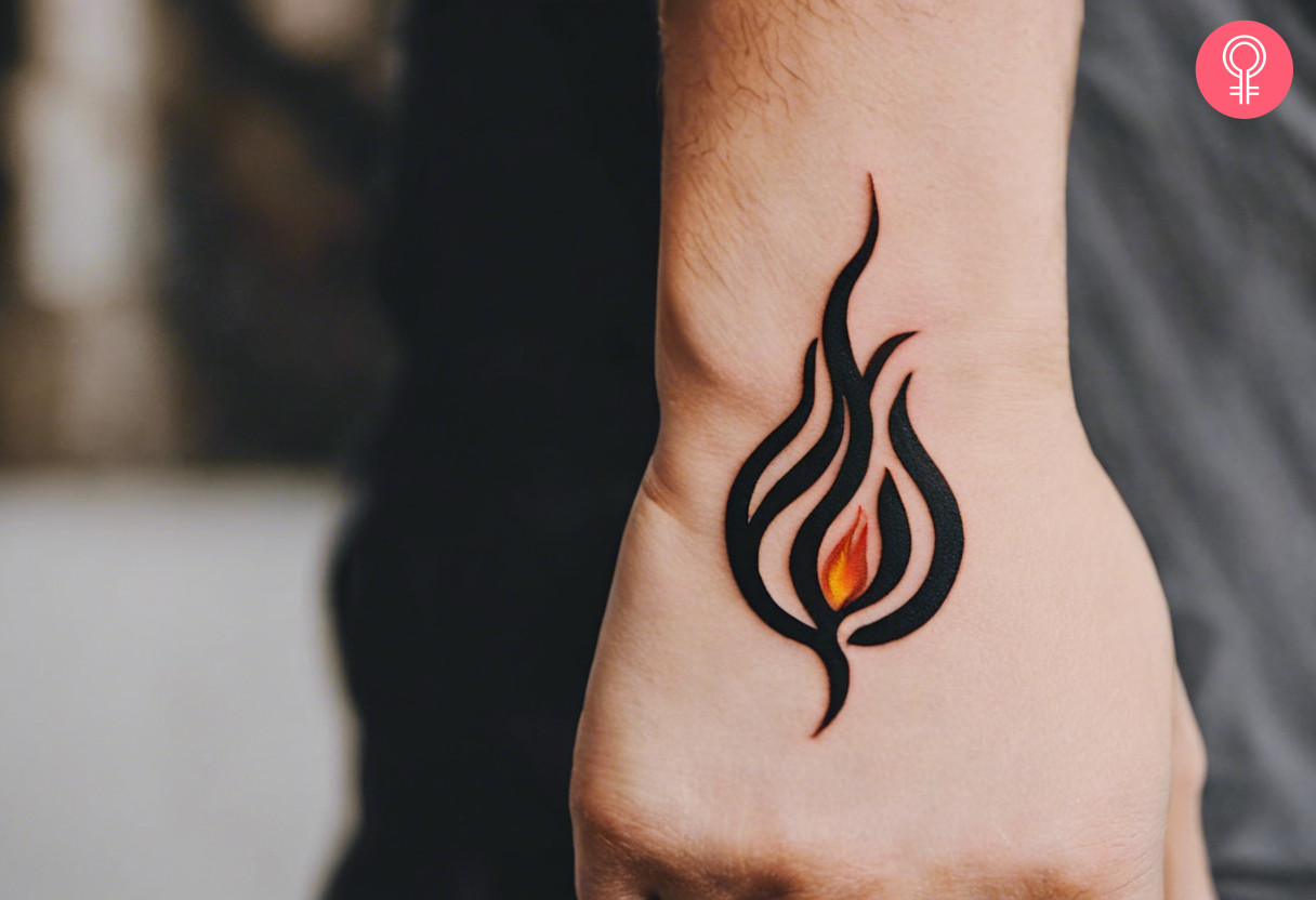A flame tattooed on the back of the hand