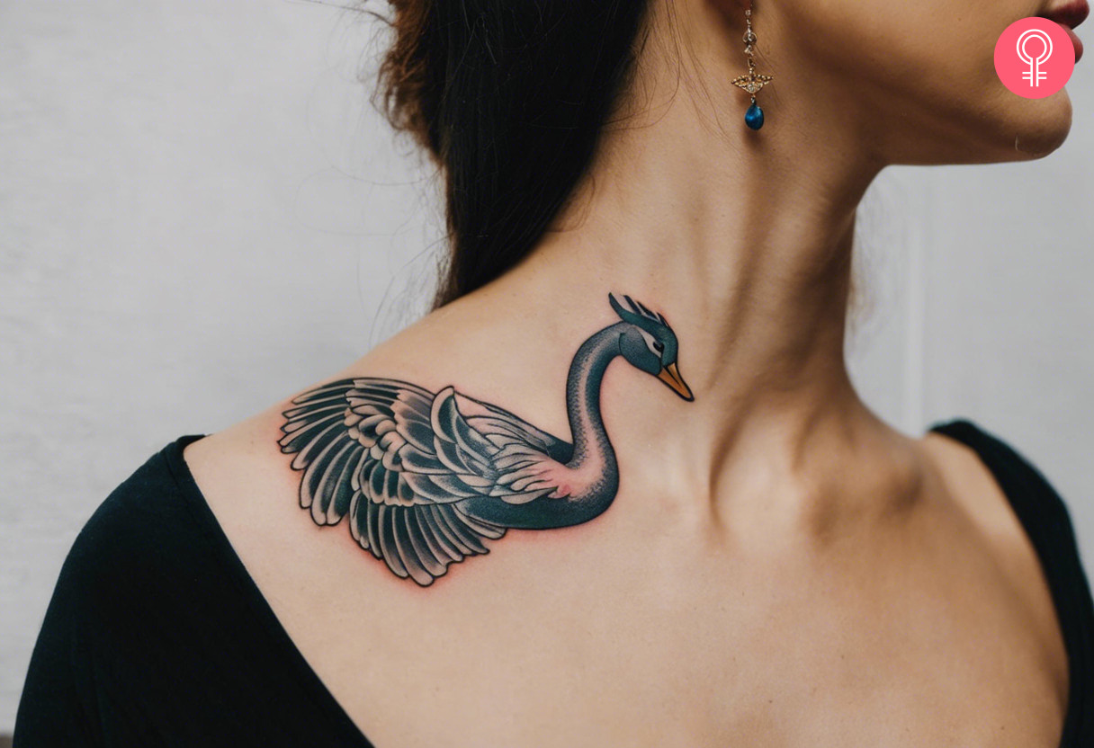 A swan tattoo on the shoulder going up the side of the neck