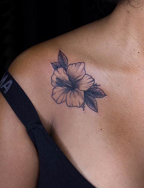 Hawaiian hibiscus tattoo design on shoulder