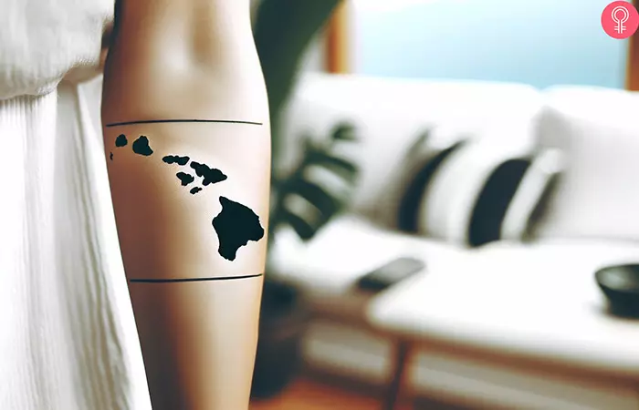 A Hawaiian island tattoo on a woman’s forearm