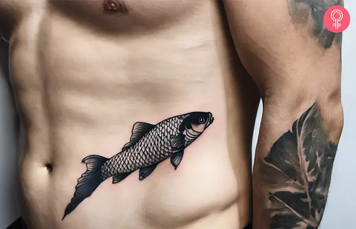 Koi fish tattoo on the rib
