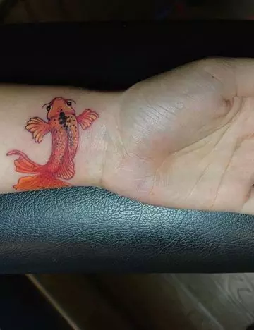 Wrist koi fish tattoo design