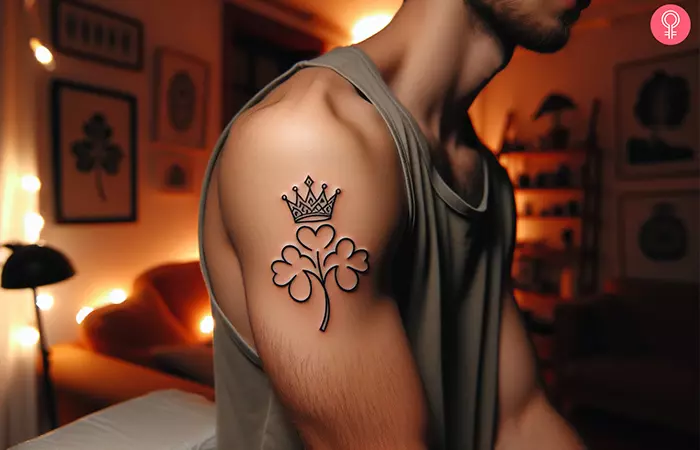 Man-with-a-fine-line-shamrock-tattoo-on-his-upper-arm