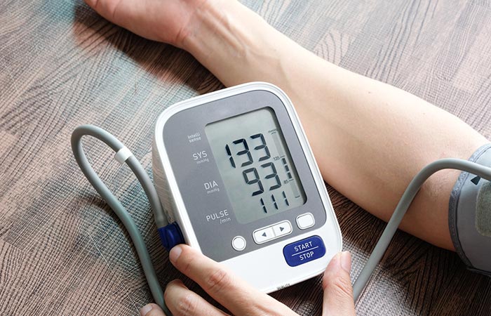 Person checking blood pressure level