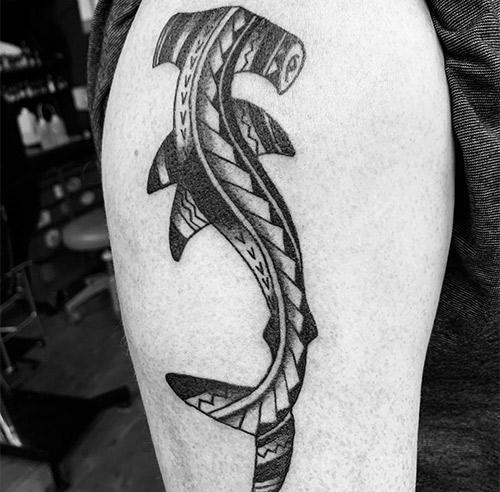Polynesian fish tattoo representing fertility, riches, and life