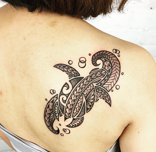 Polynesian turtle tattoo to symbolize health, fertility, peace, and longevity of life