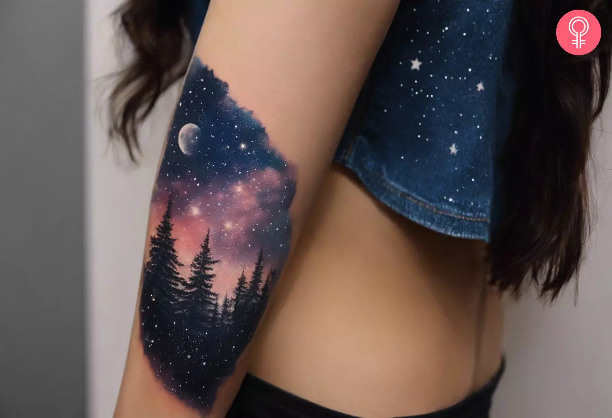 Purple night sky glitter realism tattoo on the arm of a woman